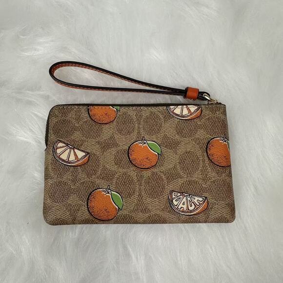 Coach Corner Zip Wristlet In Signature Canvas With Orange Print In Tan CBB82 NWT - Picture 2 of 5